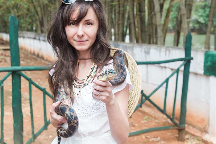 Cuba-woman-holding-snake